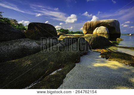 View Of A Group Of Big Stones On The Tanjung Tinggi Beach From Island Belitung/indonesia/