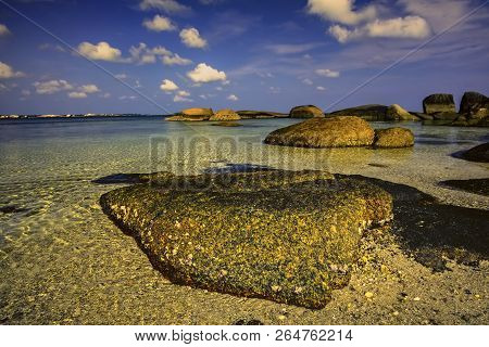 View Of A Group Of Big Stones On The Tanjung Tinggi Beach From Island Belitung/indonesia/