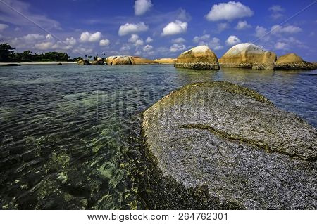 View Of A Group Of Big Stones On The Tanjung Tinggi Beach From Island Belitung/indonesia/