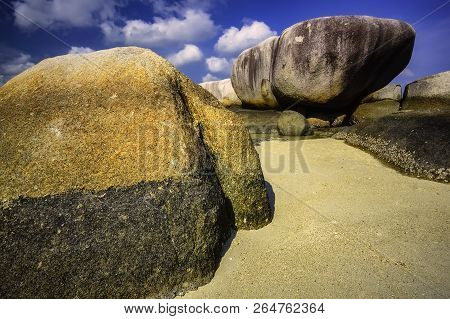 View Of A Group Of Big Stones On The Tanjung Tinggi Beach From Island Belitung/indonesia/
