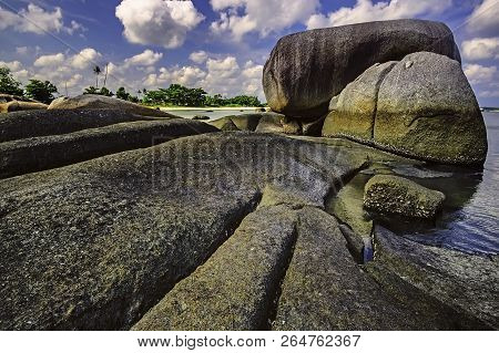 View Of A Group Of Big Stones On The Tanjung Tinggi Beach From Island Belitung/indonesia/