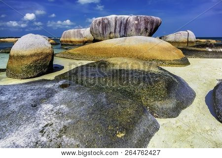 View Of A Group Of Big Stones On The Tanjung Tinggi Beach From Island Belitung/indonesia/