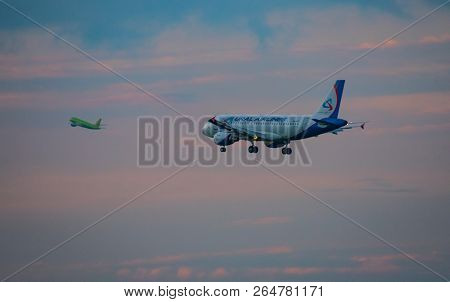 8 July 2018 Russia, Moscow. The Aircraft Airbus A319 Ural Airlines Is Landing At The Domodedovo Airp