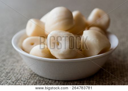 Pickled Garlic Pickles In Bowl.