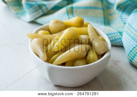 Pickled Green Pepper Pickles In Bowls.