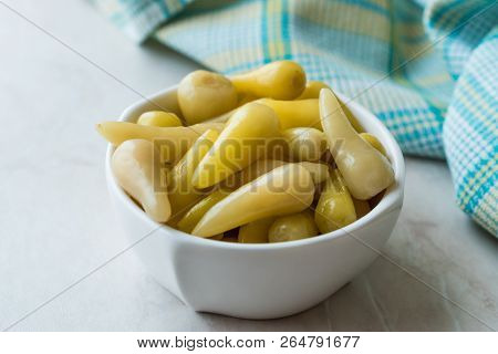 Pickled Green Pepper Pickles In Bowls.