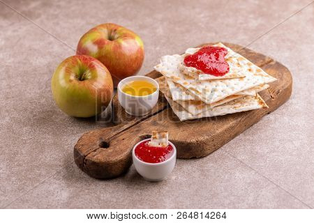 Traditional Jewish Kosher Matzo With Apples, Jam And Honey On Old Wooden Cutting Board. Copy Space