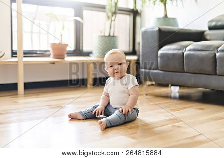 Redhead Baby Sit On The Living Room Ground