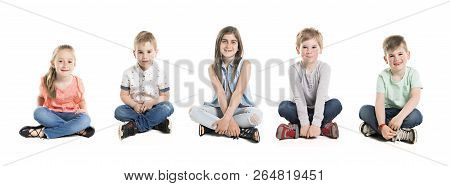 A Group Of Five Young Children In Studio