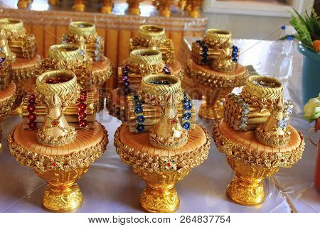 Golden Offering Pots Inside The Buddhist Temple At Ban Nong Chaeng, Phetchabun, Thailand