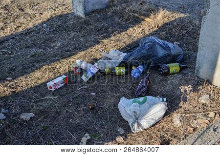 10.14.2018 Minsk, Republic Of Belarus: People Throw Waste And Garbage On The Street. Environmental P