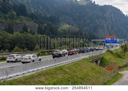 Vehicles Waiting In Line For Entering Gotthard Tunnel On Switzerland