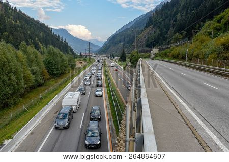 Vehicles Waiting In Line For Entering Gotthard Tunnel On Switzerland