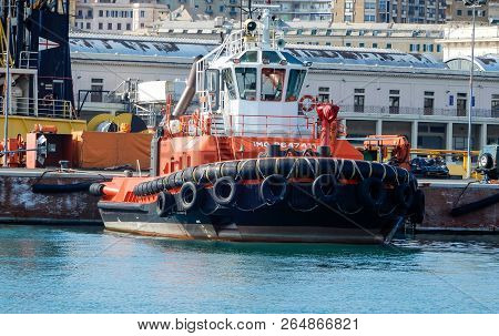 Tugboat Moored In The Port Of Genoa, Italy