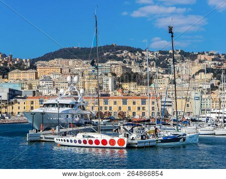 Genoa (genova), Italy, March 25, 2018 - Two Men Working On A Mast Of A Ship, In The Port Of Genoa, I