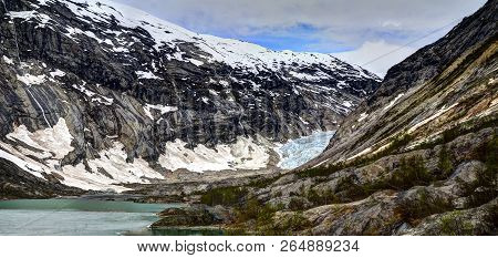 Nigardsbreen Glacier, A Beautiful Arm Of The Large Jostedalsbreen Glacier. Nigardsbreen Lies About 6