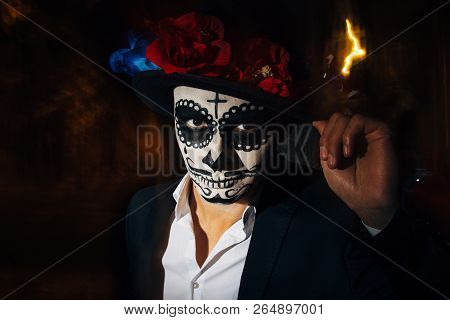 A Man With A Painted Face Of A Skeleton, A Dead Zombie, In The City During The Day. Day Of All Souls