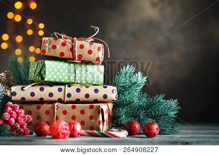 Merry Christmas And Happy New Year. Christmas Tree Toys, Christmas Tree And Christmas Gifts On Dark 