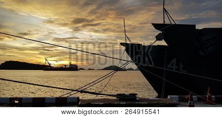 Navy Ship Mooring At Naval Base With Off Shore Ship Behide