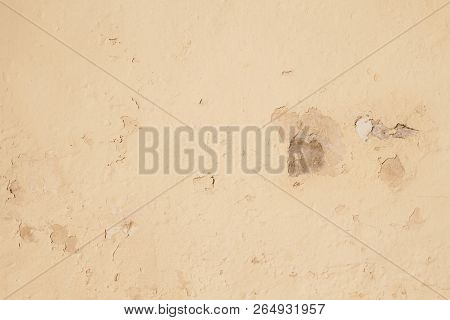 A Detail Of An Aged Stucco Wall With Copy Space.
