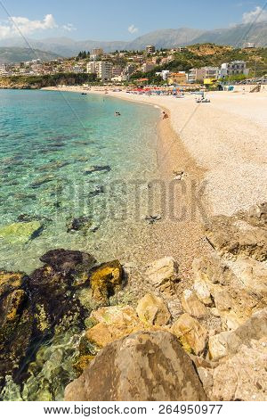 Himare, Albania- 29 June 2014: The Coast In The Tourist Town Of Himare. Stony Beach On The Adriatic 