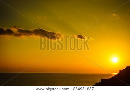Red Orange Sunset Over Sea Water Surface, Greece