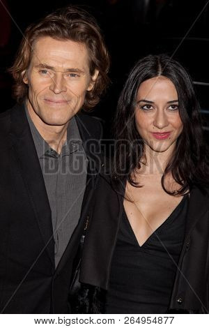 NEW YORK, NY - NOVEMBER 30, 2009: Actor Willem Dafoe and guest attends IFP's 19th Annual Gotham Independent Film Awards at Cipriani, Wall Street on November 30, 2009 in New York City.