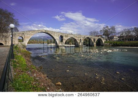 Medieval Bridge Over River Arahthos In Arta, Greece