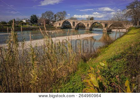 Medieval Bridge Over River Arahthos In Arta, Greece