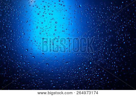 Abstract Water Drop Blue Light Spot Background Close Up