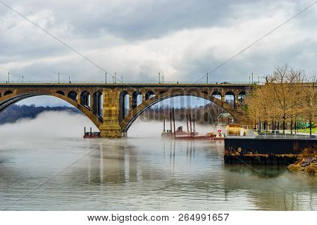 Francis Scott Key Bridge Across Potomac River, Winter Fog On The Water.