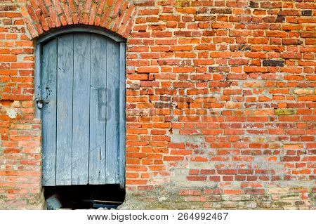 The Texture Of The Old Ancient Medieval Antique Solid Wooden Natural Thick Door With Rivets And Nail