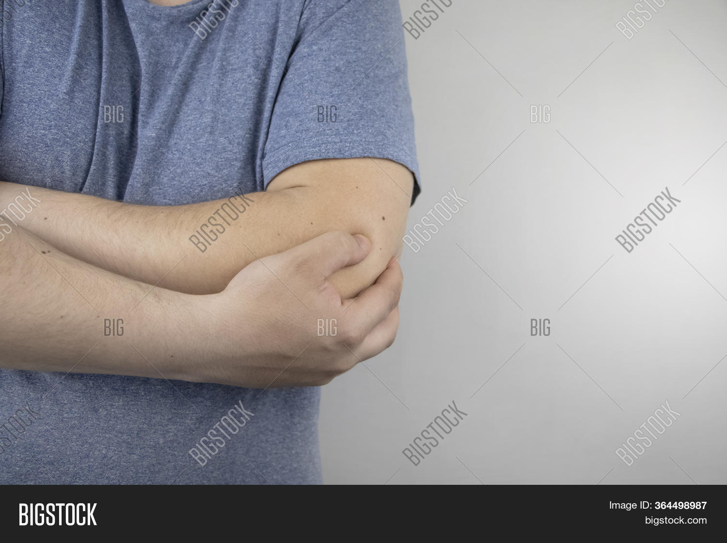 Man Suffers Elbow Pain Image & Photo (Free Trial) Bigstock