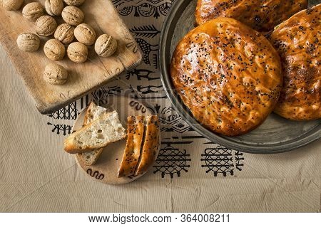 Turkish Pastry, Scone Or Bun With Walnut On Traditional Tokat Table Cloth, Homemade Pastry Concept