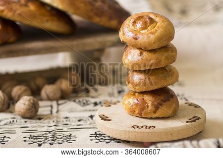 Turkish Pastry, Scone Or Bun With Walnut On Traditional Tokat Table Cloth, Homemade Pastry Concept