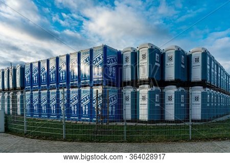 Dallgow-doeberitz, Brandenburg, Germany - February 08, 2019: A Stack Of German Porta-potties (dixi L