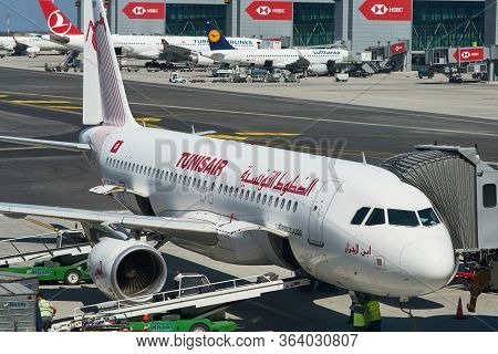 Airport Workers Loading The Luggage Bags Into A Tunisair Airbus A320 At The New Istanbul Airport, Is