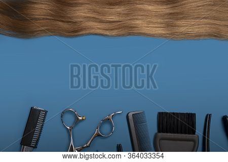 Flat Lay Composition With Light Brown Hair, Comb, Scissors And Space For Text On Color Background. H
