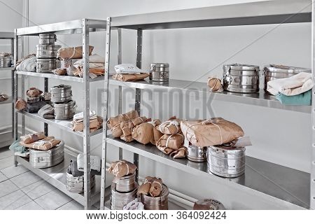 Medical Equipment Storage Rack With Stylized Instruments
