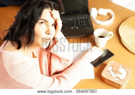 Young Woman Tired Of Work Migraine Stress