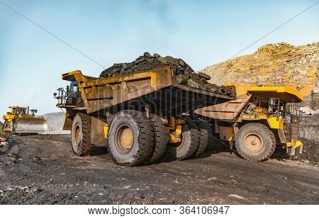 Big Yellow Mining Truck Laden Anthracite Moves Open Pit Coal Mine