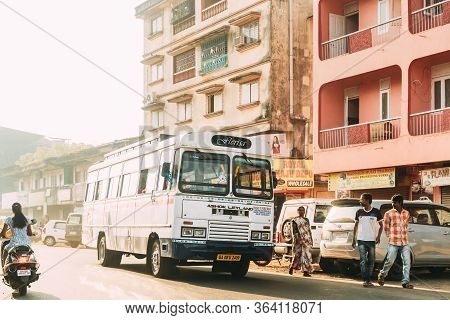 Margao, Goa, India - February 16, 2020: Old White Public Bus Moving On Street In Sunny Day.