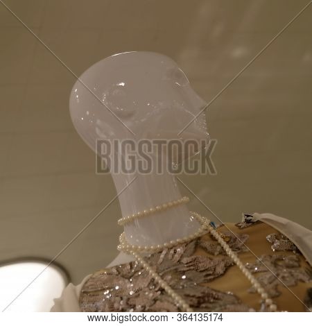 Mannequin Head In A Clothing Store
Background Image For Web Design.