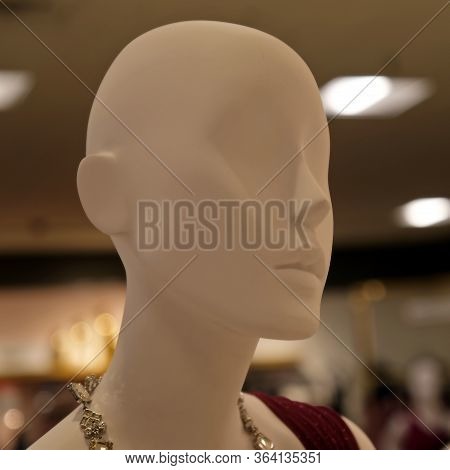 Mannequin Head In A Clothing Store
Background Image For Web Design.