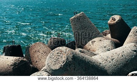 Concrete Barrage Prevents Waves In The Seaport.