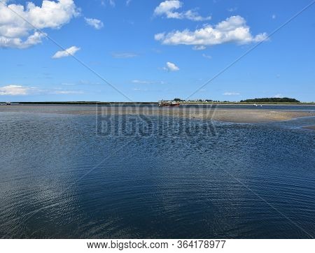 Sand Bar And Mud Flats In A Tidal River.