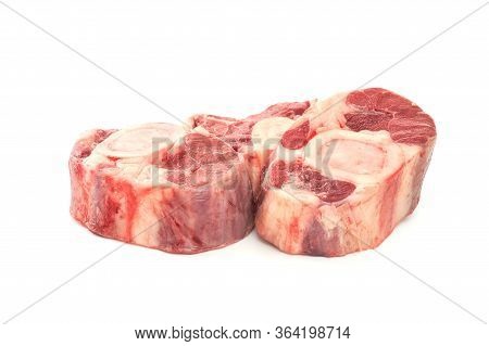 Three Slices Of Fresh Shank Steak On A White Background. Fresh Osso Buco Steaks.