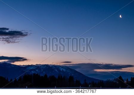 Sunrise Over The Sleepy Town Of Columbia Falls. Monatana, United States