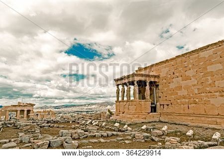 Temple Erechtheion With The Famous Porch Of The Caryatids Instead Of Columns In The Acropolis