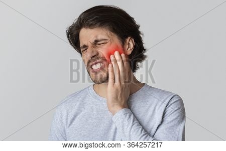 Dental Care And Health Concept. Despaired Man Endure Pain, Empty Space